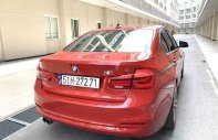 BMW 3 Series 2015 - Cần bán xe BMW 3 Series 320i sản xuất 2015, màu đỏ, giá 980tr giá 980 triệu tại Tp.HCM