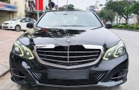 Mercedes-Benz E class 2014 - Cần bán lại xe Mercedes E class đời 2014, màu đen giá 1 tỷ 50 tr tại Hà Nội