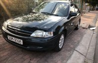 Ford Laser   2001 - Bán Ford Laser sản xuất năm 2001, màu đen  giá 89 triệu tại Đồng Tháp