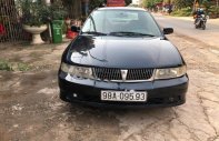 Mitsubishi Lancer GLXI 1.6 MT 2003 - Cần bán Mitsubishi Lancer GLXI 1.6 MT sản xuất 2003, màu xanh lam xe gia đình giá 125 triệu tại Bắc Giang