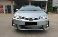 Cần bán xe Toyota Altis 1.8G AT 2018 màu bạc, xe đi ít giữ kĩ chính hãng Toyota Sure giá 700 triệu tại Tp.HCM
