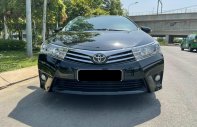 Toyota Corolla altis G 2017 - Cần bán xe Toyota Altis 1.8G CVT 2017 màu đen, xe đẹp đi kĩ giá 650 triệu tại Tp.HCM