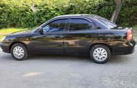 Daewoo Nubira 2003 - Cần bán lại xe Daewoo Nubira năm 2003, màu đen xe gia đình, giá 65tr giá 65 triệu tại Nghệ An