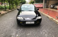 Ford Laser   LX 1.6 MT 2001 - Cần bán Ford Laser LX 1.6 MT sản xuất năm 2001, màu đen số sàn, 98 triệu giá 98 triệu tại Hải Dương