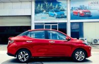 Cần bán Hyundai Grand i10 AT đời 2021, màu đỏ giá 417 triệu tại Tp.HCM