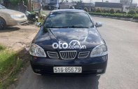 Daewoo Lacetti 2005 - Bán ô tô Daewoo Lacetti sản xuất 2005, màu đen còn mới, 110 triệu giá 110 triệu tại Tiền Giang