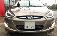 Hyundai Accent   1.4 AT 2014 - Cần bán Hyundai Accent 1.4 AT đời 2014, màu nâu  giá 350 triệu tại Quảng Bình