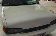 Mazda 323   1.6 MT  1994 - Cần bán Mazda 323 1.6 MT năm 1994, màu trắng giá 34 triệu tại Hà Nội