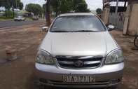 Daewoo Lacetti EX 2009 - Cần bán lại xe Daewoo Lacetti EX sản xuất năm 2009, màu bạc chính chủ giá 135 triệu tại Gia Lai