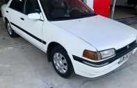 Mazda 323 1995 - Bán ô tô Mazda 323 sản xuất năm 1995, màu trắng, giá chỉ 45 triệu giá 45 triệu tại Bình Định