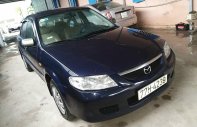 Mazda 323     2002 - Cần bán Mazda 323 năm sản xuất 2002, màu xanh lam, giá 132tr giá 132 triệu tại Bình Định