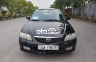 Mazda 323 2004 - Cần bán lại xe Mazda 323 sản xuất năm 2004, màu đen, giá 150tr giá 150 triệu tại Hải Phòng