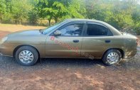 Cần bán lại xe Daewoo Nubira đời 2000, màu vàng giá 76 triệu tại Bình Phước