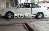 Daewoo Lacetti   EX  2005 - Cần bán Daewoo Lacetti EX đời 2005, màu trắng, xe nhập giá 115 triệu tại Tiền Giang