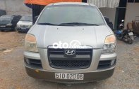 Hyundai Grand Starex 2005 - Bán ô tô Hyundai Grand Starex sản xuất 2005, màu bạc, nhập khẩu nguyên chiếc giá 158 triệu tại Tp.HCM