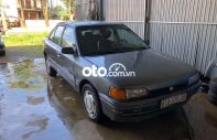 Mazda 323   1994 - Bán Mazda 323 sản xuất năm 1994, màu xám, nhập khẩu giá 27 triệu tại Gia Lai