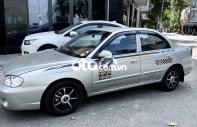 Kia Spectra MT 2005 - Bán Kia Spectra MT sản xuất 2005, màu bạc  giá 88 triệu tại Tp.HCM