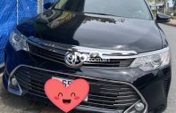 Cần bán lại xe Toyota Camry 2.0E năm sản xuất 2015, màu đen giá 650 triệu tại Cần Thơ