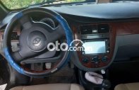 Daewoo Lacetti MT 2009 - Bán Daewoo Lacetti MT năm sản xuất 2009, màu đen giá cạnh tranh giá 130 triệu tại Quảng Bình