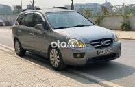 Kia Carens MT 2010 - Cần bán gấp Kia Carens MT sản xuất 2010, màu xám còn mới giá 225 triệu tại Hà Nội