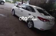 Cần bán lại xe Toyota Vios E đời 2019, màu trắng xe gia đình giá 430 triệu tại Tp.HCM