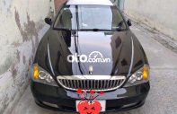 Cần bán lại xe Daewoo Magnus năm 2004, màu đen, giá 180tr giá 180 triệu tại Tiền Giang