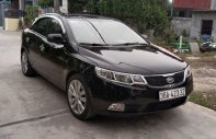 Kia Forte AT 2011 - Bán xe Kia Forte AT sản xuất năm 2011, màu đen  giá 320 triệu tại Hà Nội