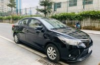 Toyota Vios   E  2015 - Bán xe Toyota Vios E năm sản xuất 2015, màu đen giá 295 triệu tại Hà Nội