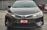 Toyota Corolla 1.8G AT  2019 - Cần bán xe Toyota Corolla Altis 1.8G AT sản xuất 2019, màu nâu chính chủ giá 660 triệu tại Tp.HCM