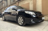 Bán Toyota Corolla Altis 1.8L sản xuất 2010, màu đen chính chủ giá 410 triệu tại Hà Nội