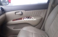 Nissan Grand livina 2011 - Cần bán gấp Nissan Grand livina sản xuất năm 2011, màu xám xe gia đình giá 295 triệu tại Đà Nẵng