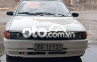 Mazda 323 1996 - Cần bán lại xe Mazda 323 2.0MT sản xuất 1996, màu trắng, xe nhập giá 23 triệu tại Nam Định