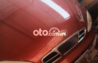 Daewoo Lanos 2002 - Bán xe Daewoo Lanos MT năm 2002, màu đỏ, nhập khẩu  giá 85 triệu tại Bình Định