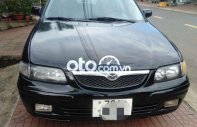 Mazda 626  MT 2000 - Cần bán xe Mazda 626 MT năm sản xuất 2000, màu đen, nhập khẩu nguyên chiếc  giá 108 triệu tại Phú Yên