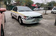 Mazda 323 1997 - Bán ô tô Mazda 323 2.0MT sản xuất 1997, màu trắng, nhập khẩu giá 33 triệu tại Nghệ An