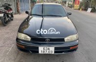 Bán ô tô Toyota Camry GLi sản xuất 1993, màu đen, nhập khẩu  giá 135 triệu tại Tiền Giang