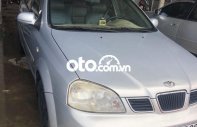 Daewoo Lacetti 2004 - Cần bán Daewoo Lacetti EX sản xuất năm 2004, màu bạc, 135 triệu giá 135 triệu tại Tiền Giang