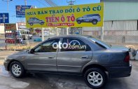 Mazda 323  GLX 1998 - Cần bán gấp Mazda 323 GLX năm sản xuất 1998, màu xám, giá chỉ 60 triệu giá 60 triệu tại Tiền Giang