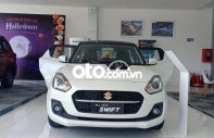 Suzuki Swift 2021 - Cần bán Suzuki Swift 1.4AT sản xuất 2021, màu trắng, xe nhập giá 550 triệu tại Cần Thơ