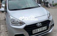 Hyundai Grand i10 1.2MT Base 2018 - Bán Hyundai Grand i10 1.2MT Base sản xuất 2018, màu bạc xe gia đình giá 262 triệu tại Cà Mau