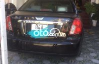 Daewoo Lacetti 2005 - Cần bán gấp Daewoo Lacetti năm 2005, màu đen, 120 triệu giá 120 triệu tại Trà Vinh