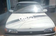 Mazda 323 1995 - Bán ô tô Mazda 323 sản xuất 1995, màu trắng, nhập khẩu giá 30 triệu tại Sóc Trăng