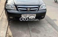 Daewoo Lacetti EX 2009 - Cần bán gấp Daewoo Lacetti EX sản xuất năm 2009, màu đen, nhập khẩu giá 155 triệu tại Bình Dương