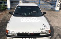 Bán Mazda 323 năm 1995, màu trắng, nhập khẩu giá 55 triệu tại Hậu Giang