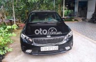 Kia Cerato 2017 - Bán Kia Cerato 1.6MT năm sản xuất 2017, màu đen xe gia đình  giá 400 triệu tại Tiền Giang