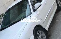 Kia Spectra 2004 - Bán xe Kia Spectra sản xuất 2004, màu trắng, nhập khẩu, giá 100tr giá 100 triệu tại Nghệ An