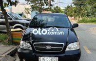 Kia Carnival 2005 - Bán Kia Carnival 2.7MT sản xuất năm 2005, màu đen, xe nhập chính chủ, 157 triệu giá 157 triệu tại Tp.HCM