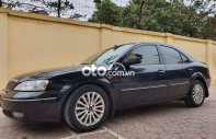 Ford Mondeo 2004 - Màu đen giá 129 triệu tại Nam Định