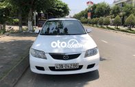 Mazda 323 2002 - Màu trắng giá 95 triệu tại Quảng Nam