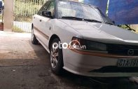 Mazda 323 1995 - Màu trắng giá ưu đãi giá 42 triệu tại Bình Dương